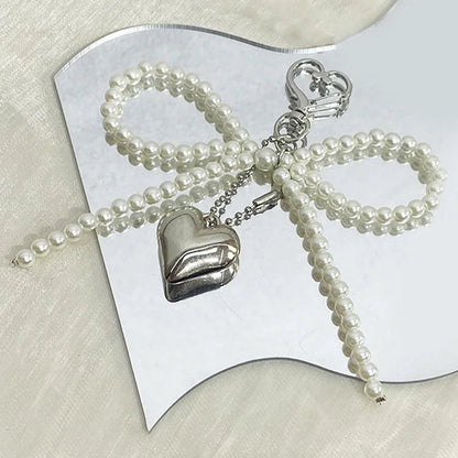 Parel strik sleutelhanger